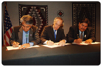 Signing this historic Navajo-Hopi Intergovernmental Compact are, from left to right, Navajo Nation President Joe Shirley Jr., Interior Secretary Dirk Kempthorne, and Hopi Vice Chairman Todd Honyaoma.