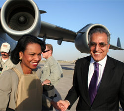 Secretary Rice arrived to Baghdad, Iraq for meetings with political leaders on October 5, 2006. She was greeted by U.S. Ambassador Dr. Zalmay Khalilzad (right). [State Department photo by Josie Duckett]