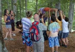Boys participate in a team-building exercise at the National Leadership Camp, July 2008. [Peace Corps] 