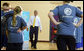 President George W. Bush speaks to members of the Peace Players basketball team Monday. June 16, 2008, during a visit to the Lough Integrated Primary School in Belfast, Ireland. White House photo by Shealah Craighead