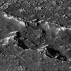 A portion of a chain of impact craters on Jupiter's moon Callisto is seen 
in this image taken by the Galileo spacecraft on November 4, 1996. This 
crater chain on Callisto is believed to result from the impact of a split 
object, similar to the fragments