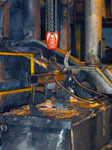 Lead tap at reverberatory furnace