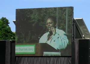 Assistant Secretary Frazer appears on large screen during her remarks to the Save Darfur rally crowd. [State Department Photo April 2006]