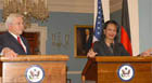 Secretary Rice speaks to press as German Foreign Minister Steinmeier looks on, Washington, DC, Dec. 8, 2006. State Dept. photo.