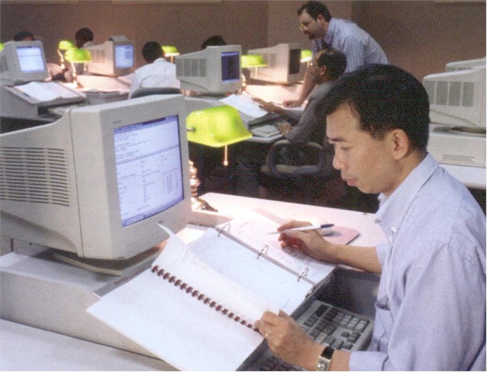 Picture of a man working at the computer