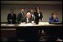 As they watch live media coverage of the day's events in the Presidential Emergency Operations Center, Vice President Dick Cheney and senior staff witness the collapse of the South Tower of World Trade Center Sept. 11, 2001. White House photo by David Bohrer