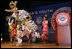 Members of the Three Affiliated Tribes Youth Dance Troupe perform at the Helping America's Youth Fourth Regional Conference in St. Paul, Minn., Friday, August 3, 2007. The dancers, ranging in age from 10 to eighteen, showcased six styles of Plains Powwow Dancing. Each style of dance represents a specific history and tells a story of American Indian culture. A segment of the conference addressed the unique challenges facing tribal youth.