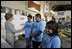 Laura Bush meets members of the Homeboy Industries program in Los Angeles during her tour of the facility April 27, 2005.