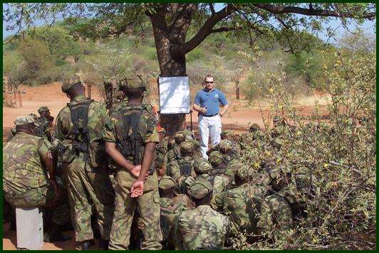 A program implementer addressing troops during the GPOI exercise. [State Dept. Bureau of Political-Military Affairs photo]