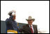 Donning his own style of graduation cap, Vice President Cheney participates in the U.S. Air Force Academy Commencement ceremonies at Falcon Stadium in Colorado Springs, Colo., May 30, 2001.