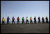  Crew members of the USS John C. Stennis stand on the deck, Friday, May 11, 2007 during Vice President Dick Cheney's arrival to the aircraft carrier. 