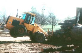 Unsafe operation of loader in log yard