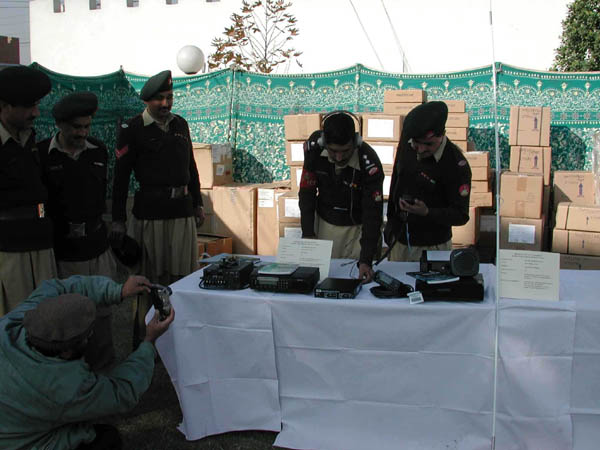 Pakistani border police test new communications equipment provided by the Bureau of International Narcotics and Law Enforcement Affairs