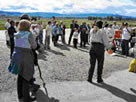 Photo of volunteers receiving information for the weed roundup.