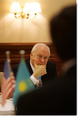 Vice President Dick Cheney listens as leaders of Kazakh opposition political parties share their ideas regarding political and economic reform and the advancement of democracy in Kazakhstan, Saturday, May 6, 2006, during a breakfast meeting in Astana. White House photo by David Bohrer