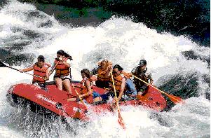 Rafters on a river run.