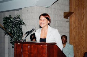 WWIT graduate Stephanie Drake speaks at the Hope Center graduation ceremony. (Women's Bureau photo)