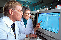 Photo: Chemists Richard Anderson and Marilyn Polansky use high-performance liquid chromatography to identify compounds from cinnamon that improve the action of insulin. Link to photo information