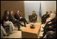 Ms. Barbara Bush talks about her experiences visiting AIDS clinics in Africa with U.S. Ambassador to the U.N. John Bolton, seated at her left, UN Secretary-General Kofi Annan, seated next to Mrs. Bush, and staff members during a visit to the United Nations in New York June 2, 2006. Mrs. Laura Bush also spoke about HIV/AIDS to the United Nations General Assembly's High-Level Meeting on AIDS. White House photo by Shealah Craighead