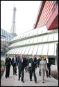 The Eiffel Tower stands tall in the background as Mrs. Laura Bush walks with Stephane Martin, President of the Musee du quai Branly, center, in Paris Monday, Jan. 15, 2007. Mrs. Bush toured the museum with US Ambassador Craig Stapleton, left, and his wife Mrs. Stapleton. White House photo by Shealah Craighead