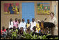 Mrs. Laura Bush delivers remarks at Grand Medine Primary School Tuesday, June 26, 2007, in Dakar, Senegal. During her visit, Mrs. Bush announced that 805,000 books were donated to Senegal this summer through President Bush's Africa Education Initiative. White House photo by Shealah Craighead