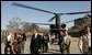 Laura Bush and U.S. Ambassador to Afghanistan Zalmay Khalilzad arrive at the Presidential Palace in Kabul, Afghanistan Wednesday, March 30, 2005. White House photo by Susan Sterner