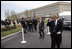 President George W. Bush salutes to military personnel as he arrives at the Pentagon Thursday, Sept. 11, 2008, for the dedication of the 9/11 Pentagon Memorial at the Pentagon in Arlington, Va.