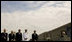 President George W. Bush is joined from left by former Secretary of Defense Donald Rumsfeld, U.S. Secretary of Defense Robert Gates, Chairman of the Joint Chiefs of Staff, Admiral Michael Mullen and James J. Laychak, chairman of the Pentagon Memorial Fund, Inc. as they bow their heads during a Moment of Silence Thursday, Sept. 11, 2008, at the dedication of the 9/11 Pentagon Memorial at the Pentagon in Arlington, Va.