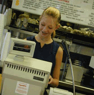 Teen Working at Cash Register