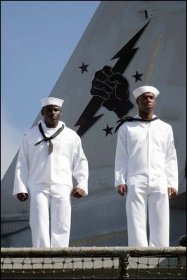 Pearl Harbor, Hawaii (Apr. 26, 2003) -- Sailors man the rails aboard the aircraft carrier USS Abraham Lincoln (CVN 72) while transiting into Pearl Harbor for a brief one-day liberty port after the ship’s 10-month deployment in support of Operation Iraqi Freedom. U.S. Navy photo by Photographer’s Mate 1st Class William R. Goodwin