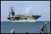 Pearl Harbor, Hawaii (Apr. 26, 2003) -- Spectators welcome the aircraft carrier, USS Abraham Lincoln (CVN 72) to Pearl Harbor. U.S. Navy photo by Photographer’s Mate 2nd Class Joshua L. Pritekel