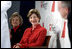 Laura Bush sits with Lois Ingland, a heart disease survivor, during an event at the Carolinas Medical Center Wednesday, Feb. 15, 2006, in Charlotte, NC. Despite having none of the risk factors of heart disease, Lois, a mother of four, suffered a heart attack when she was 36 years old.