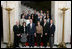 President George W. Bush and Mrs. Laura Bush stand with the crew members of the Space Shuttle Discovery (STS-116), Space Shuttle Atlantis (STS-117), Space Shuttle Endeavour (STS-118), and International Space Station Expeditions 14 and 15, Wednesday, Nov. 14, 2007 in the Grand Foyer of the White House. Since December 2006, NASA astronauts have journeyed more than 15 million miles in space and conducted more than a dozen space walks.