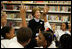 Laura Bush introduces her Scottish Terrier puppy Miss Beazley to fourth-grade students from Maury Elementary School during a visit to the Martin Luther King Jr. Memorial Library in Washington, D.C., Tuesday, April 12, 2005.