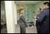 Dr. Babak Nayeri, Medical Director of the Native American Community Health Center, and Marcus Harrison, CEO of the Native American Community Health Center, give Laura Bush a tour of the Native American Community Health Center in Phoenix, Ariz., April 26, 2005.