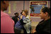 Laura Bush greets students at a reading class while visiting Chipman Middle School in Alameda, Calif., April 28, 2005.