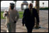 Vice President Dick Cheney and Crown Prince Sheikh Mohammad bin Zayed of Abu Dhabi, walk together to their meeting Friday May 11, 2007, at the Emirates Palace Hotel in Abu Dhabi, United Arab Emirates.