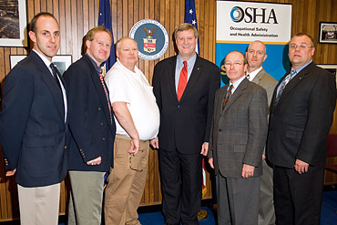 Assistant Secretary of OSHA Edwin G. Foulke, Jr. poses with the Curtis Lumber Co., Inc. contingent. Left to Right: Ron Zimmerman, Glens Falls Hospital, Participant; Allan Jenney, Coordinator, EHS Excellence; Joe Whalen, Graduate, International Paper; Assistant Secretary Foulke, Jr.; Paul Raino, Participant, Gregory Supply; Ron Coons, Participant, Northeast Panel and Truss; and Paul Kniskern, Administrator, Curtis Lumber Co., Inc.