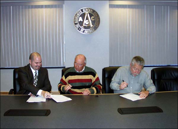 (left to right) Nick Walters, Area Director, Peoria Area Office, Region V, USDOL-OSHA; Robert Germann, President, Southern Illinois Building Association (SIBA), and Tim Garvey, Executive Director, SIBA sign the agreement on March 4, 2008.