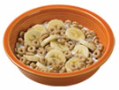 Bowl of cereal with bananas