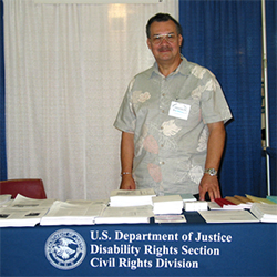 Staff member at ADA booth