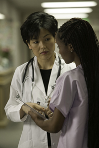 Doctor speaking with a nurse