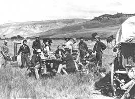 Photograph of group of members of the 1870 U.S. Geological and Geographical Survey of the Territories (Hayden Survey) in Wyoming field camp.