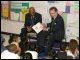Secretary Rod Paige and Senator Arlen Specter read to a class of first grade students during a recent school visit to Marshall Elementary School in Harrisburg, PA.
