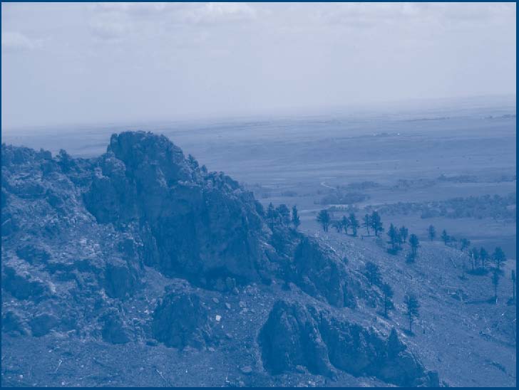 photo of Bear Butte, South Dakota is a sacred site to many Native Americans. In August 2006, CRS provided onsite support to mediate tensions between native American groups and the Sturgis Motorcycle Rally that typically draws upwards of 500,000 motorcycle enthusiasts and events to the town very near the Native American sacred site.
