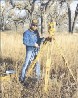 USGS employee setting up survey