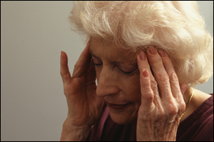 Picture of woman with a head ache