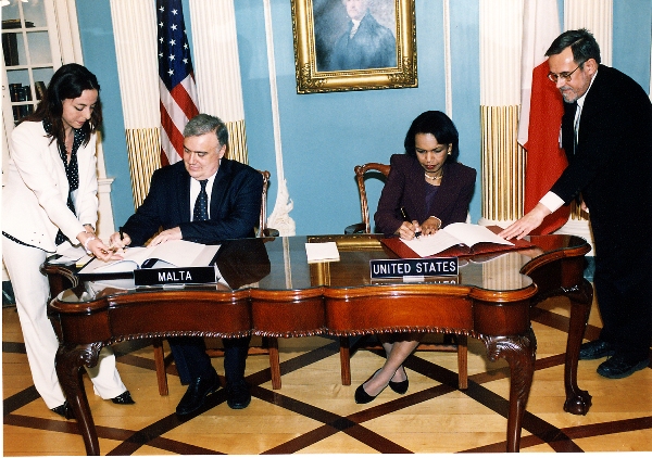 Secretary Rice and Minister of Foreign Affairs of the Republic of Malta Michael Frendo sign a bilateral Proliferation Security Initiative ,PSI, shipboarding agreement. State Dept. photo