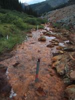 A field experiment in Mineral Creek, Colo., used 18 drive point wells along a 33-meter study reach to sample for ground-water inflow to the stream of metal-rich water (copper, zinc, and other metals) from abandoned mine sites. Identification of such inflows, when no surface manifestation occurs, is one of the applications of stream-tracer injections