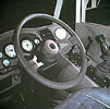 Steering wheel inside of work truck cab